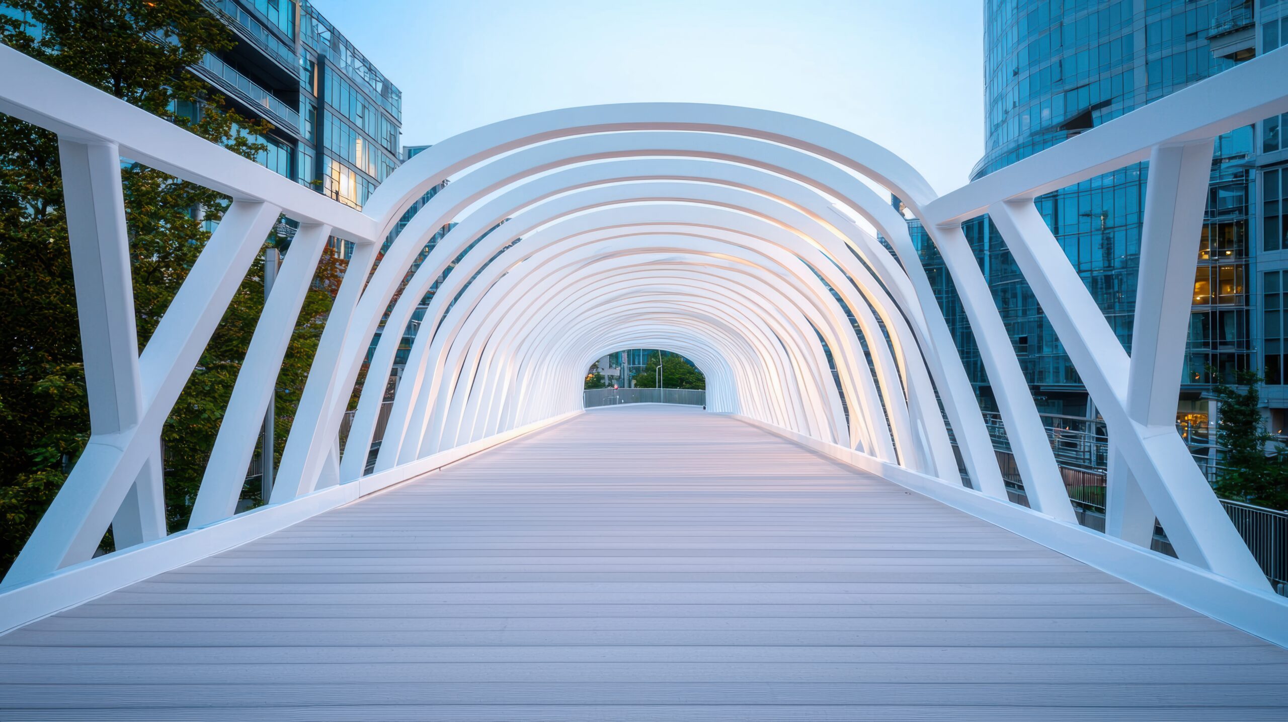 a detailed shot of a futuristic pedestrian bridge, with its unique design, intricate structure, and integration with the surrounding urban fabric.