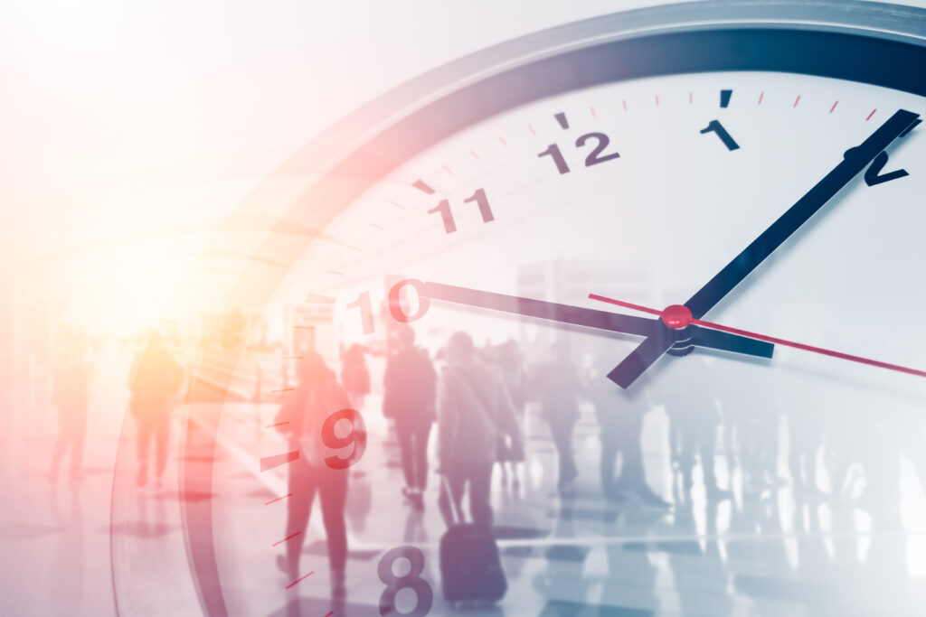 business times concept people walking overlay with time clock