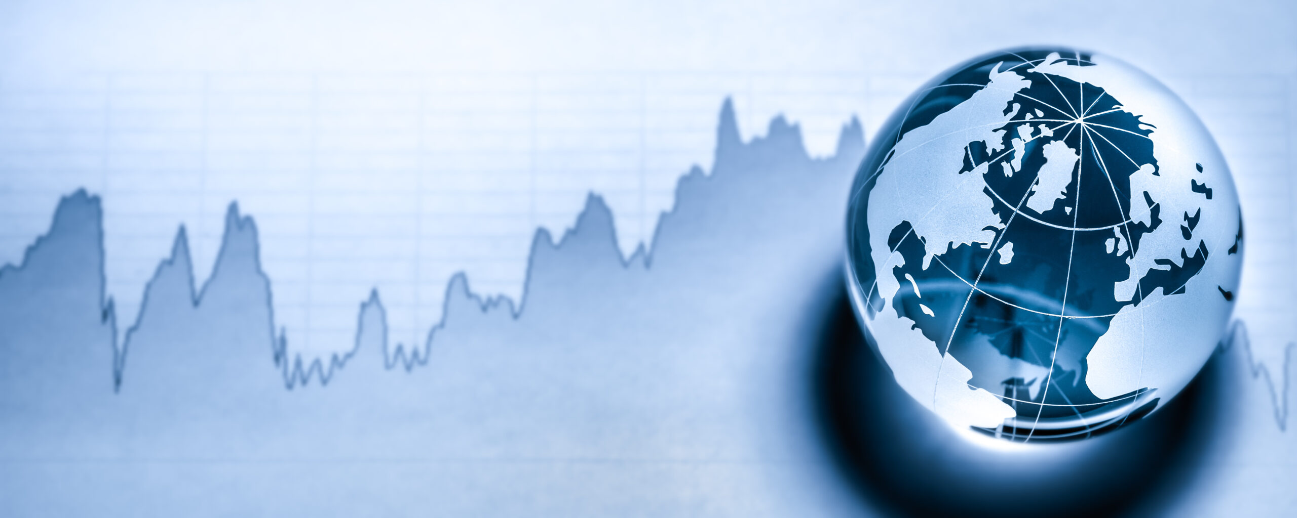 crystal earth on stock market graph global economy concept