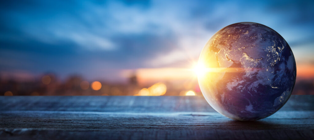 planet earth on the background of blurred lights of the city. co