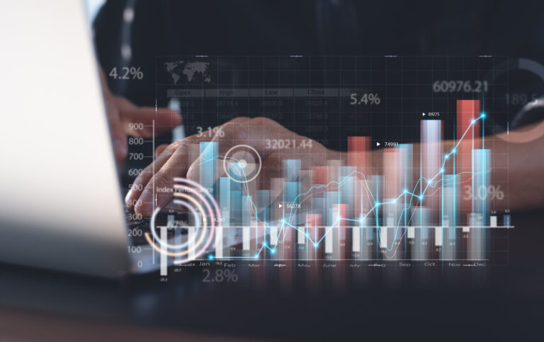 businessman analyzing financial data, economic growth graph chart on laptop computer. business planning and strategy. analysing trading of exchange, financial report. finance and investment