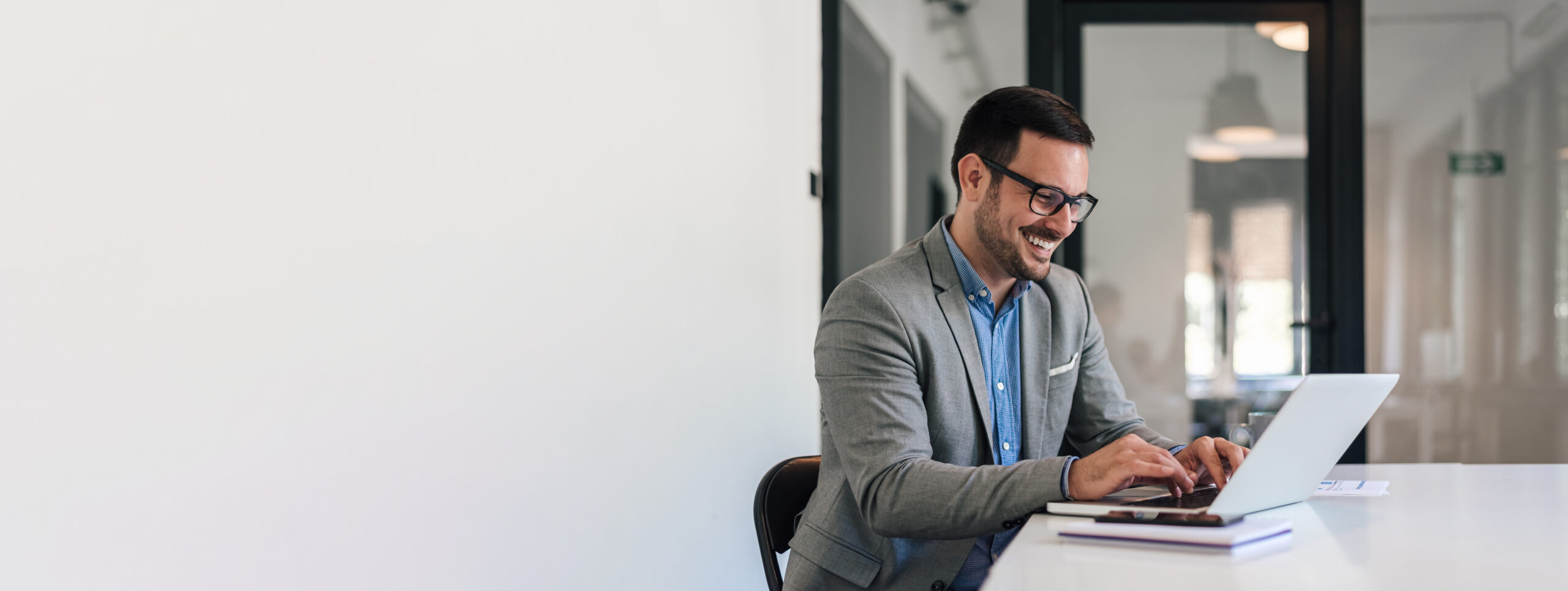 cheerful male businessman entrepreneur professional working on l